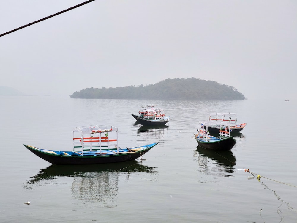 red and white boat on body of water during daytime