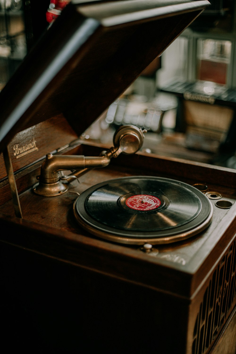 brown and silver vinyl record player