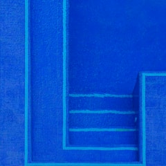 Side view of a pool showing a level change and added depth.