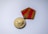 gold and red round pendant
