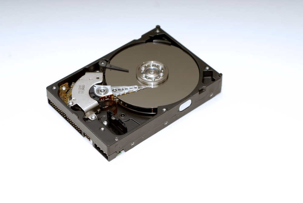 black and silver hard disk drive