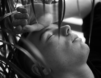 grayscale photo of womans face