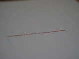 Close-up of a minimalist editorial layout featuring elegant typography on a beige background.