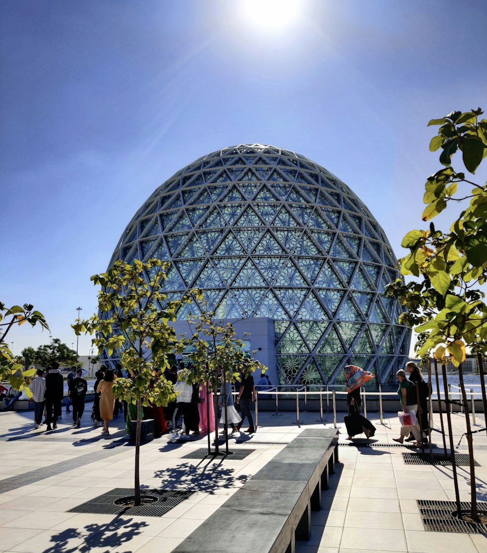 people walking near dome building during daytime