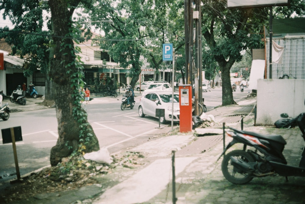 cars parked on side of the road during daytime