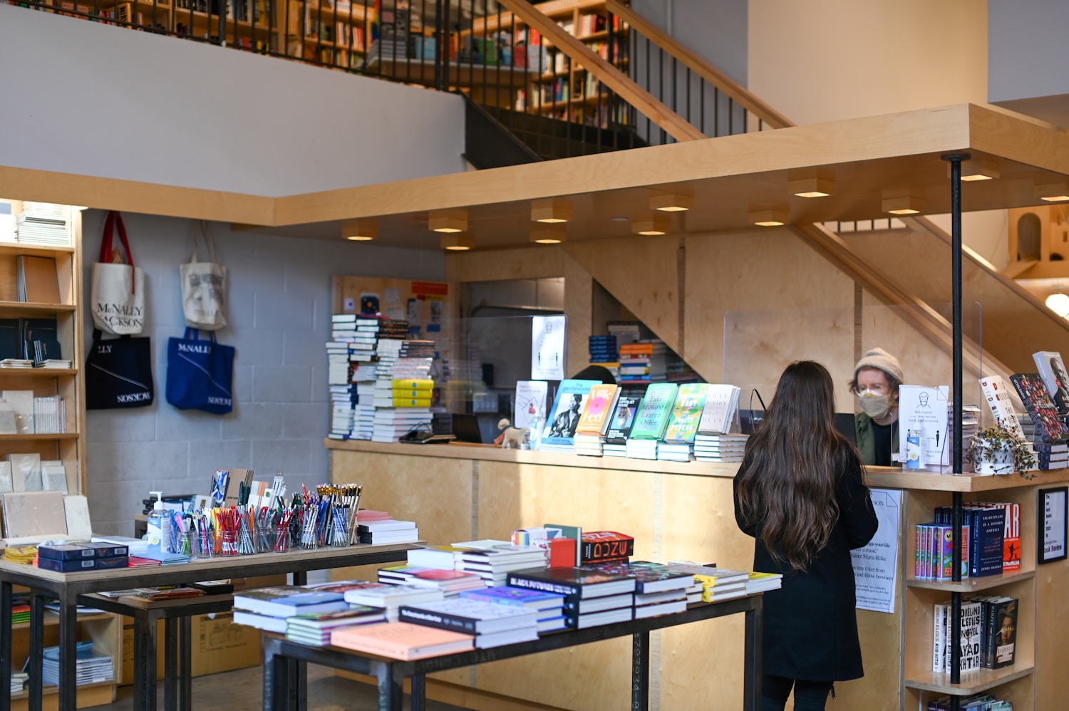 Image of diverse group of people reading books
