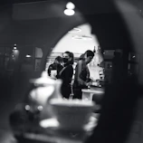 A photographer capturing candid moments of a local restaurant’s bustling kitchen.