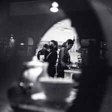 A vibrant photo of a chef collaborating with a cooking influencer in a modern kitchen.