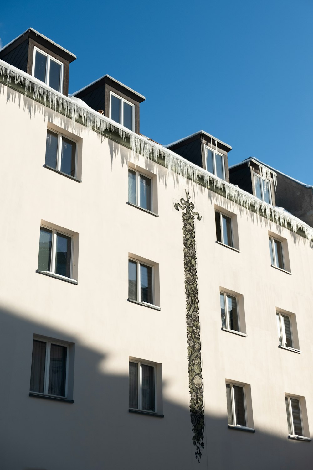 white concrete building under blue sky during daytime