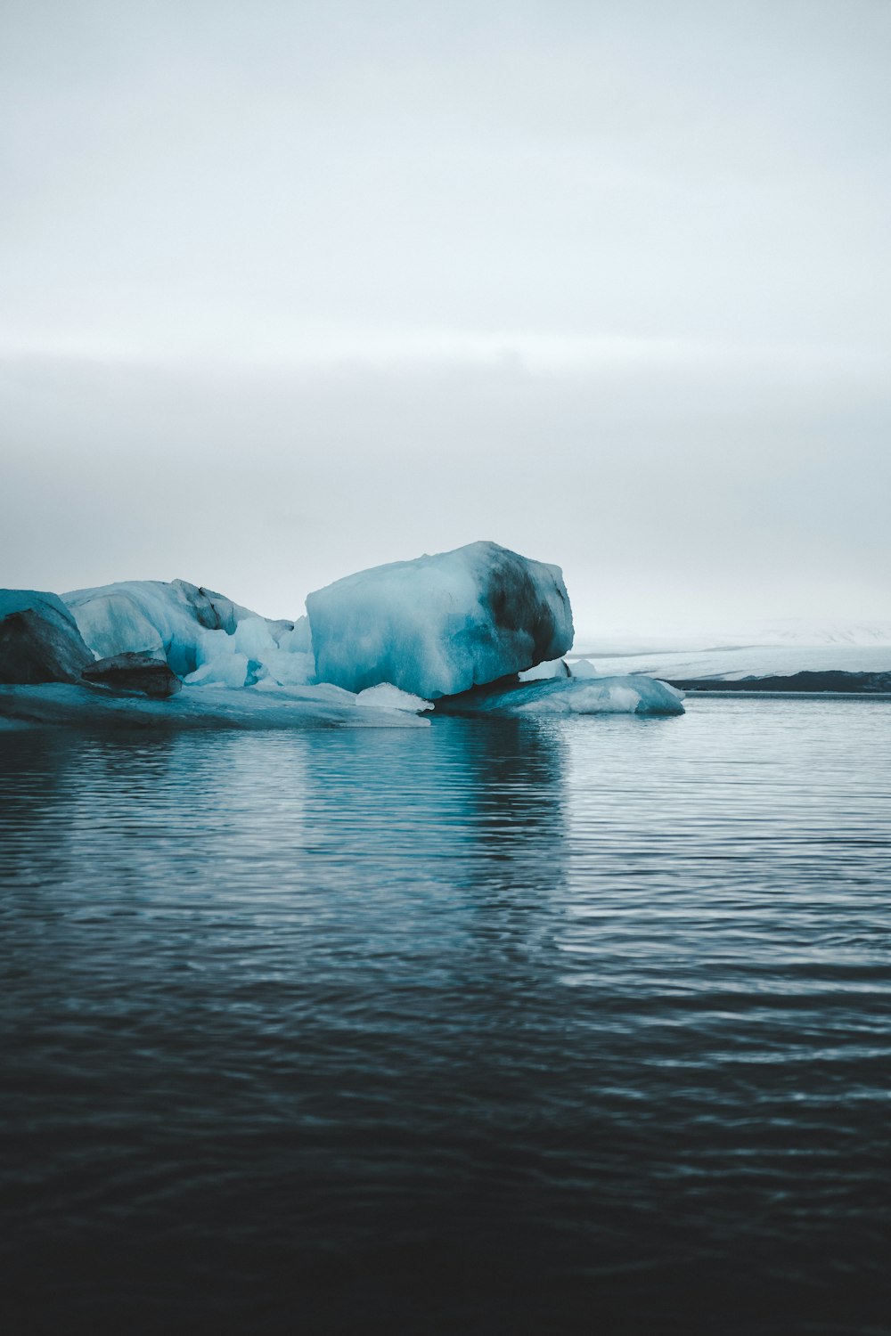 ice formation on body of water during daytime