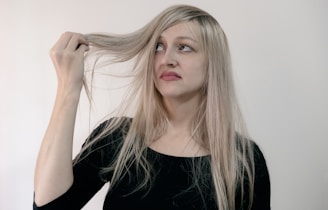 woman in black scoop neck shirt