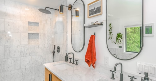 red towel on stainless steel towel rack