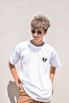 boy in white crew neck t-shirt wearing black sunglasses