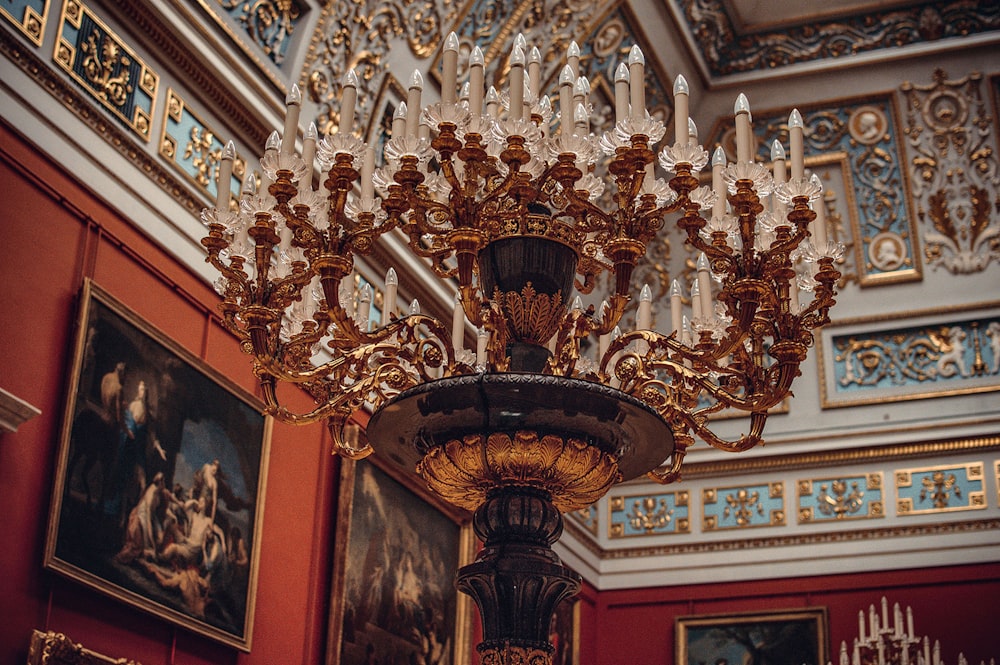 gold and white uplight chandelier