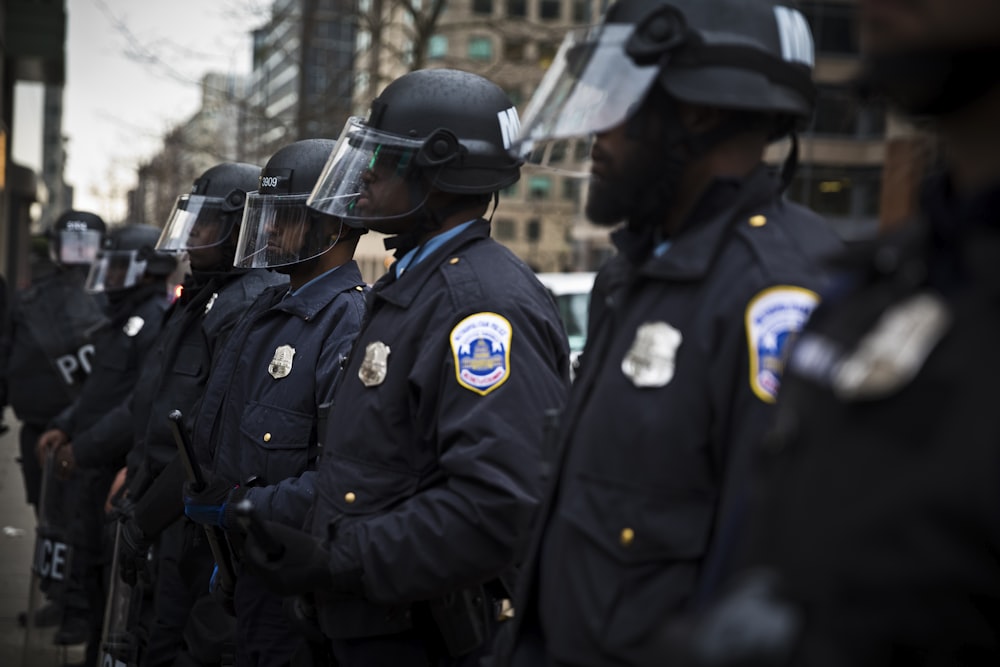 2 police men in black uniform