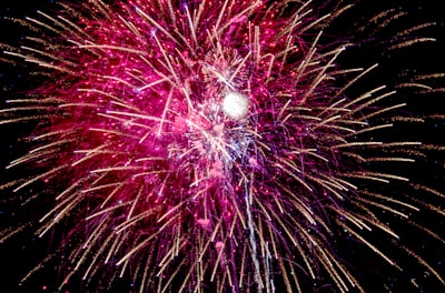 red and white fireworks display sparkling teams background