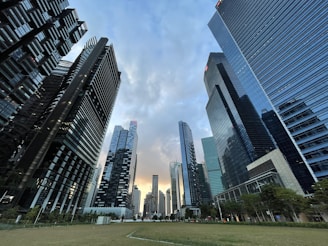 gray concrete building under cloudy sky during daytime