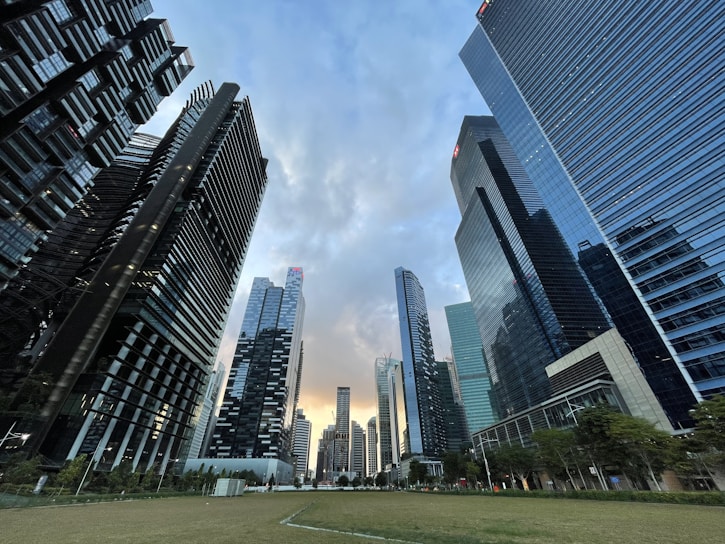 gray concrete building under cloudy sky during daytime