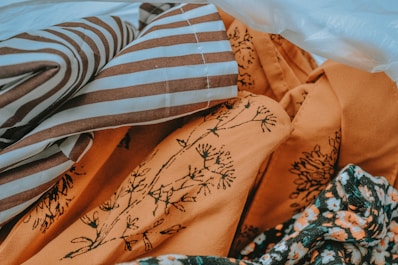 white and blue striped textile