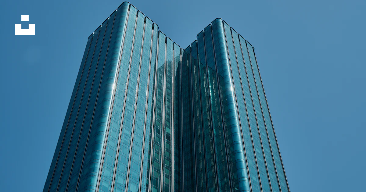 Blue glass walled high rise building photo – Free City Image on Unsplash