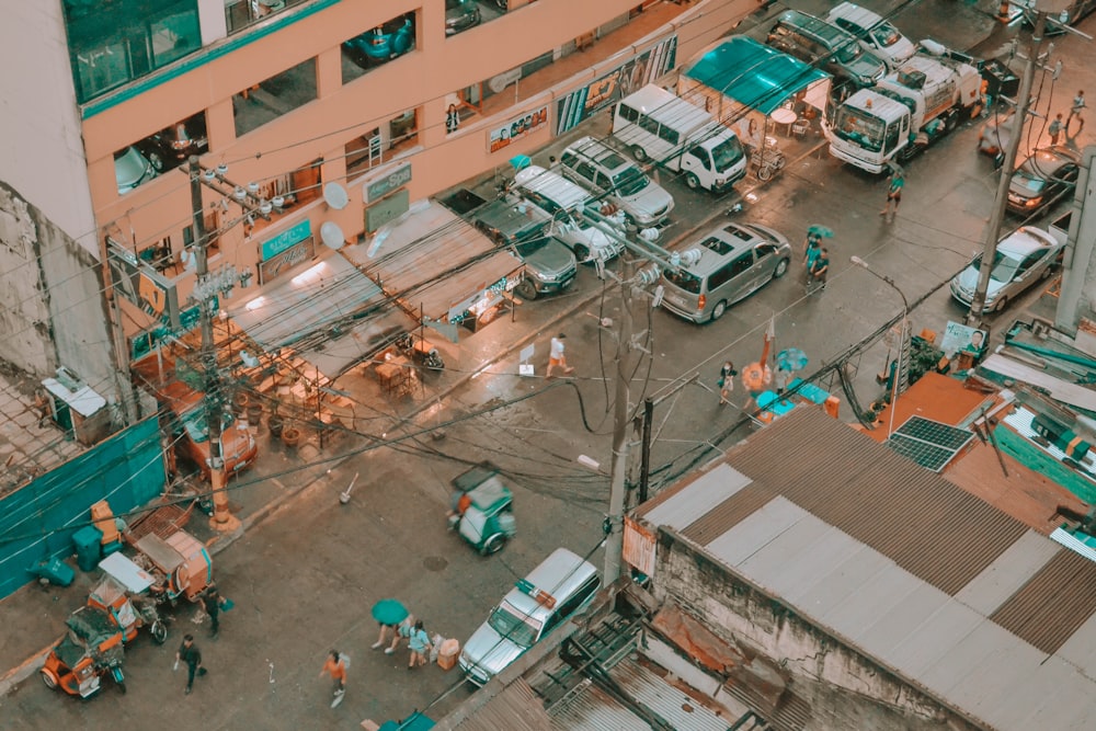 cars parked on street near buildings during daytime