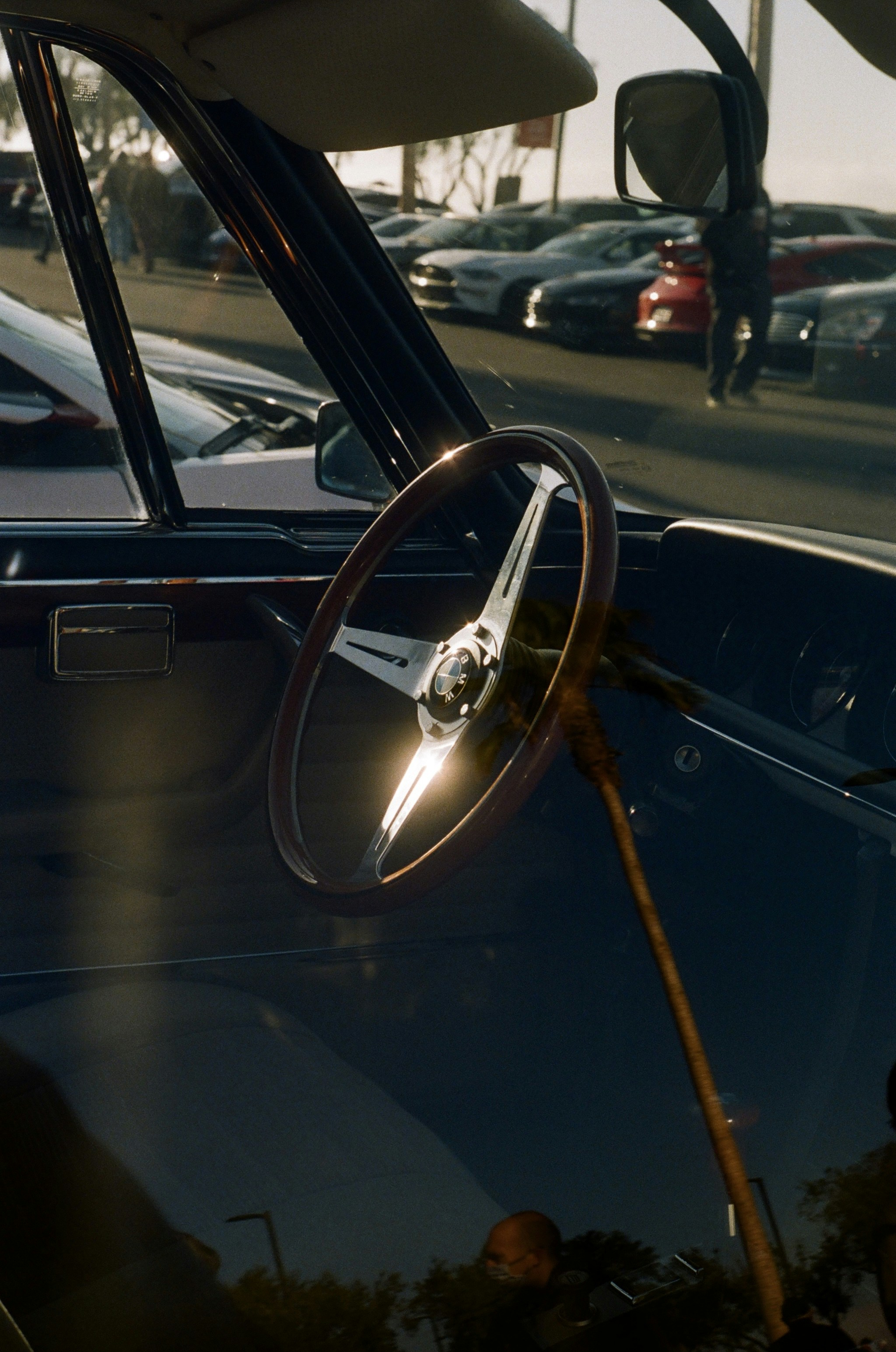 black car with brown steering wheel
