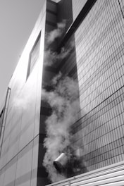 Before and after photo of a building facade cleaned with high-pressure water and steam.