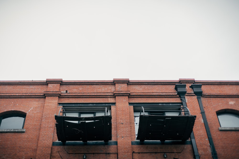 brown concrete building under white sky during daytime