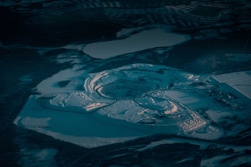 aerial view of lake and mountains