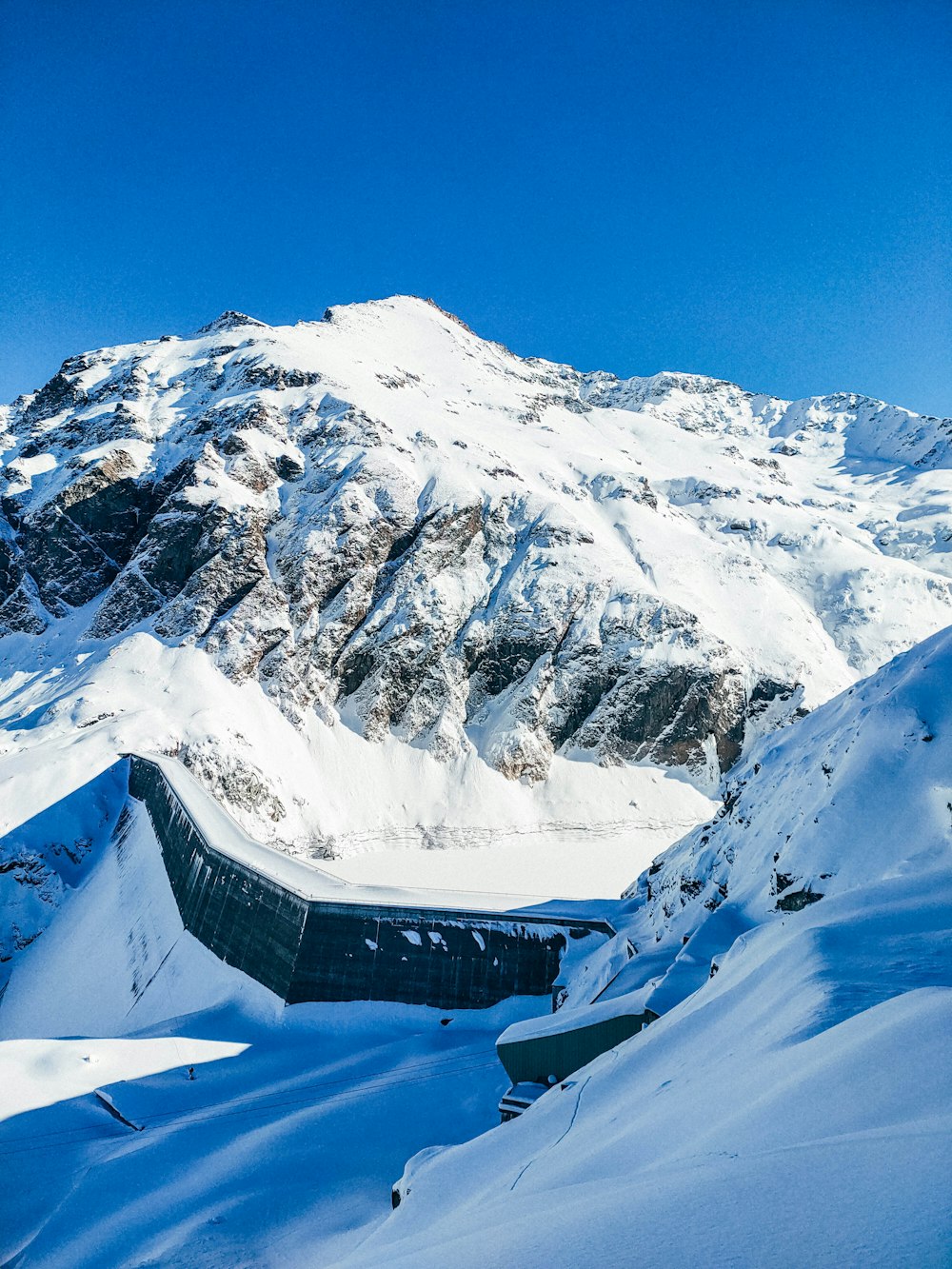 snow covered mountain during daytime