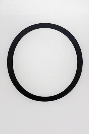 black round frame on white surface
