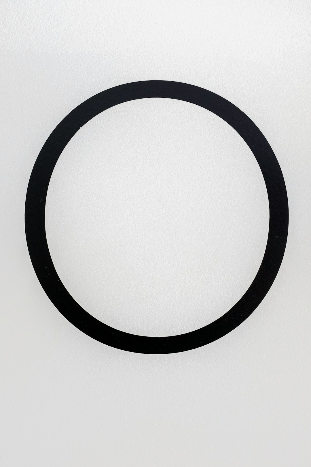 black round frame on white surface