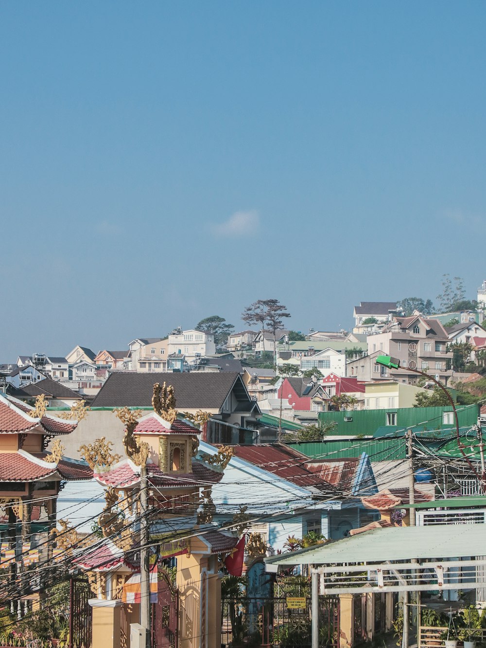 brown and white houses under blue sky during daytime