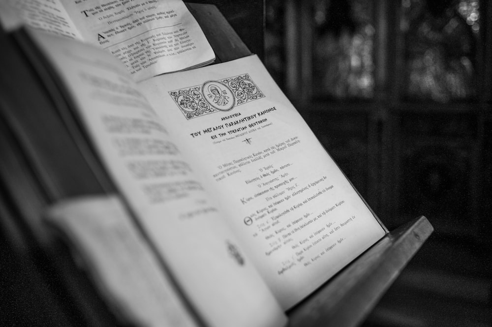 white book page on brown wooden table