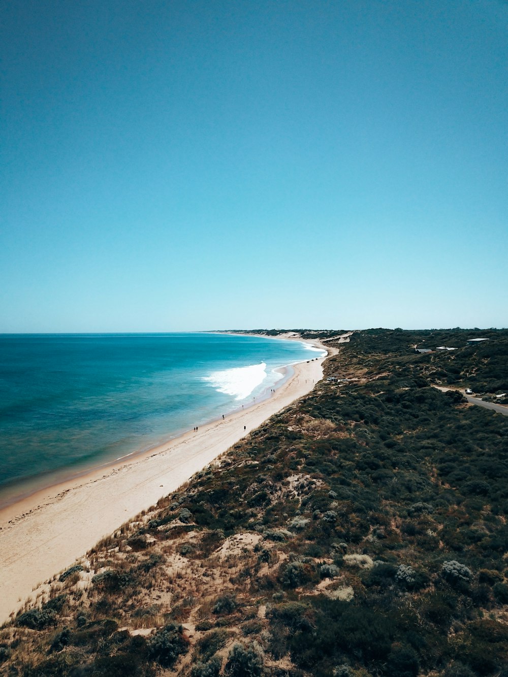 blue sea under blue sky during daytime