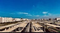 A panoramic view of a railway station equipped with modern signaling.