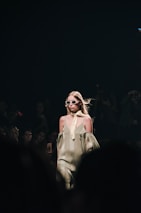 woman in white dress wearing sunglasses