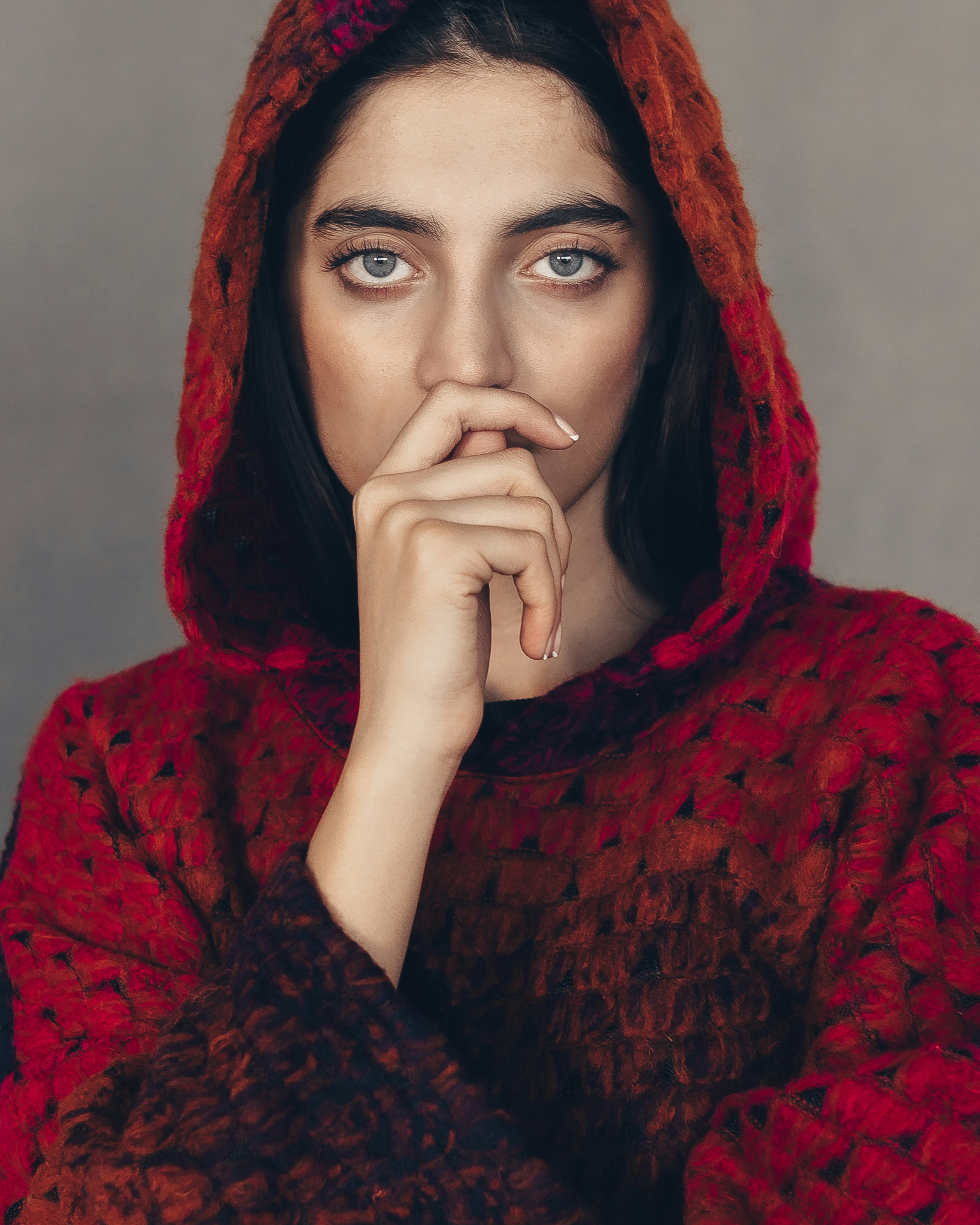 woman in red and black hijab