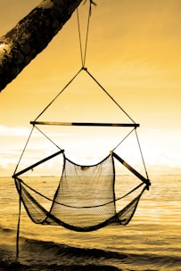 A cozy hammock chair perfect for outdoor relaxation.
