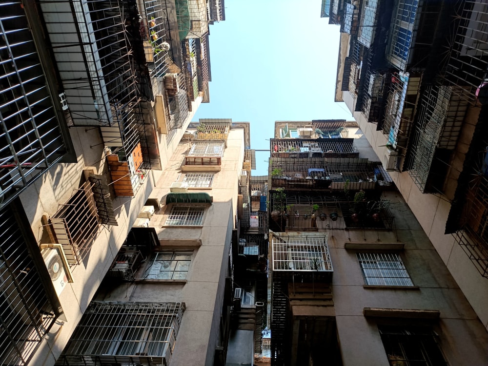 low angle photography of high rise buildings during daytime