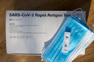 An HIV self-test kit laid out with clear instructions and a calm background.