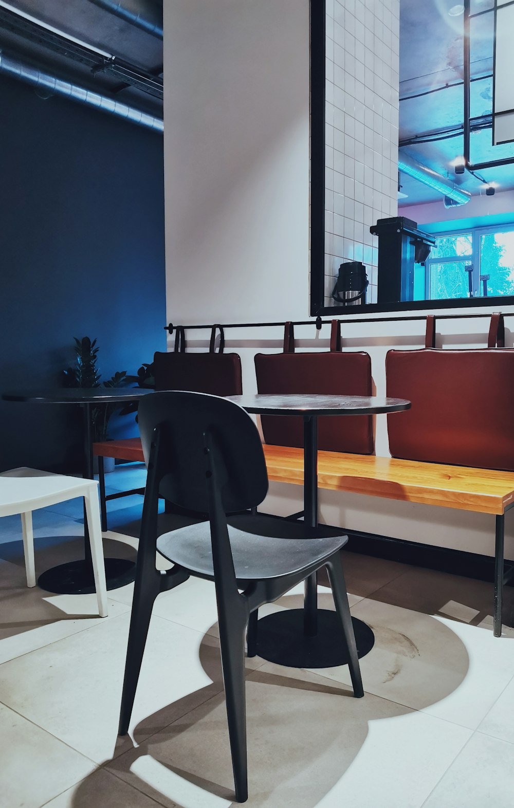 black and white wooden table and chairs