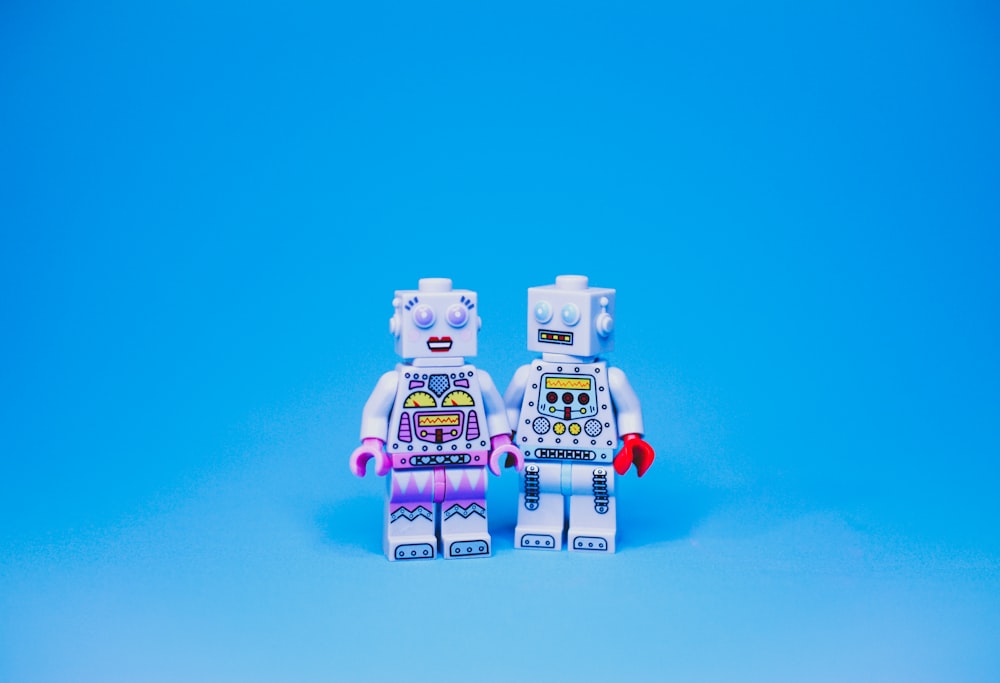 white and purple robot toy