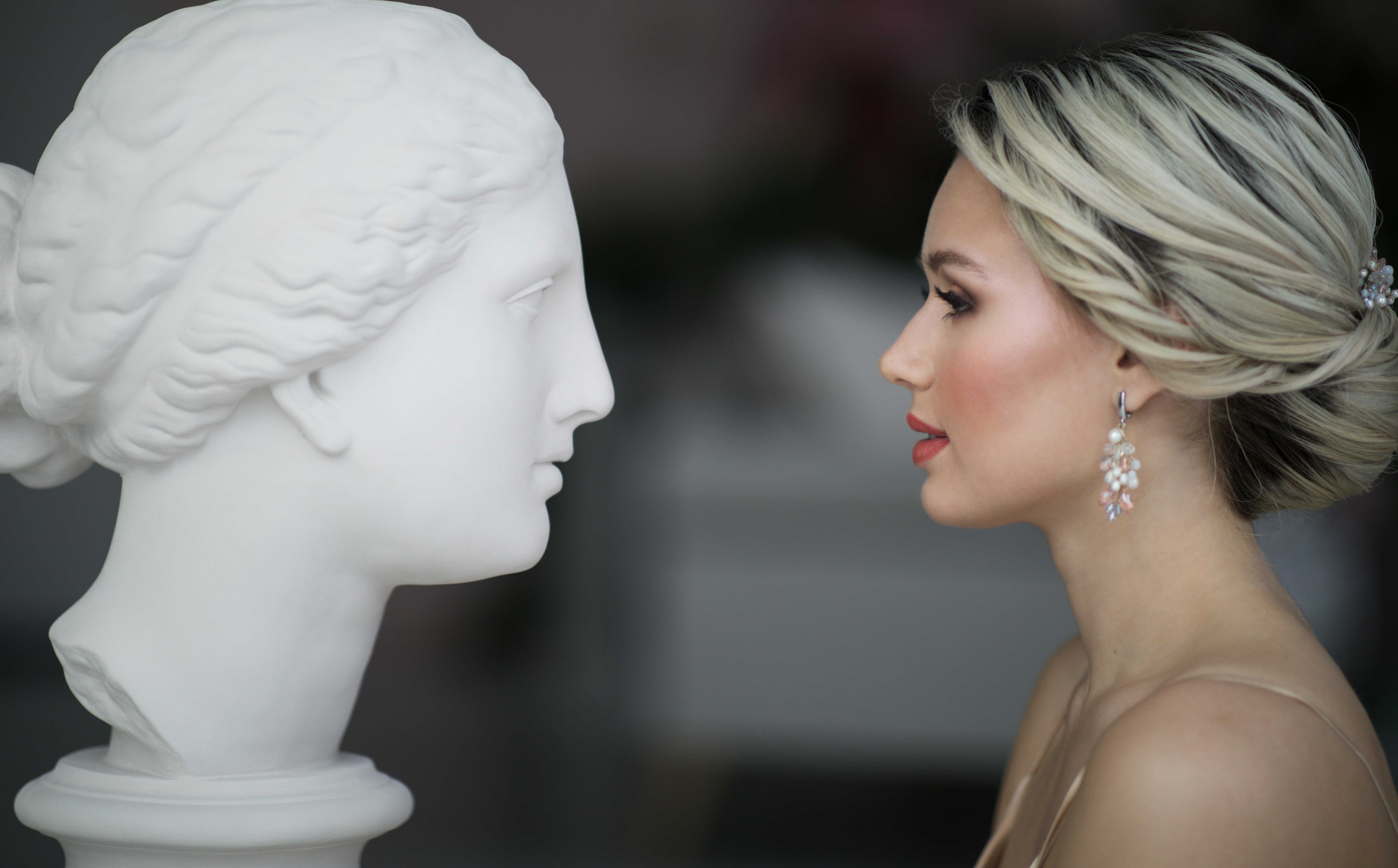 white ceramic statue of woman