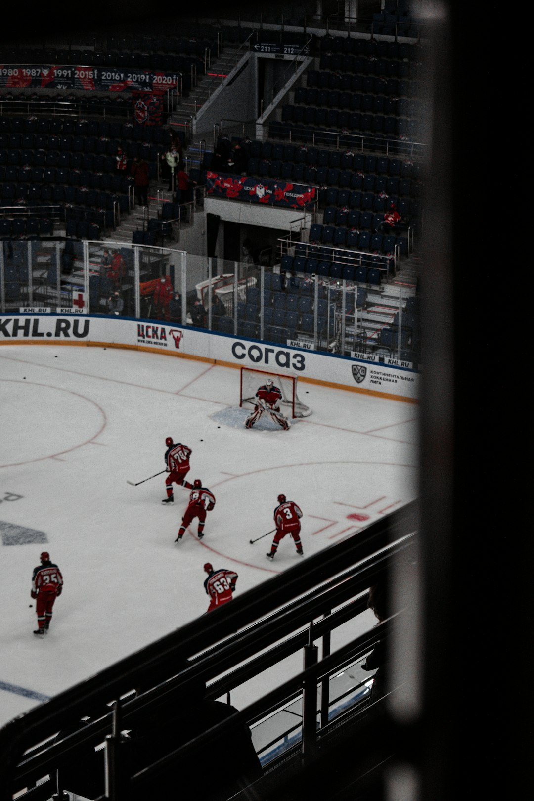 people playing ice hockey on ice hockey field