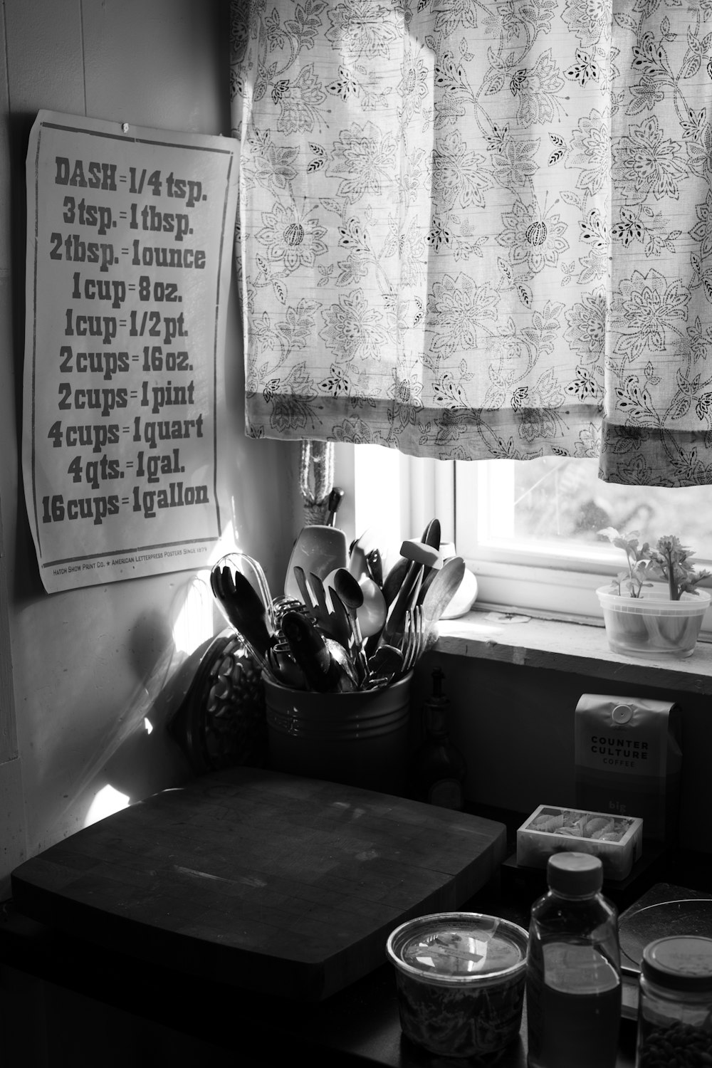 white and black floral window curtain