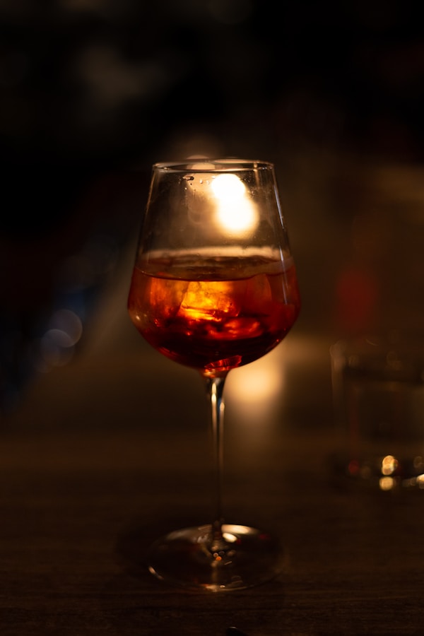 An Aperol Spritz in candle lit restaurant ambience.by Nicholas Doyle