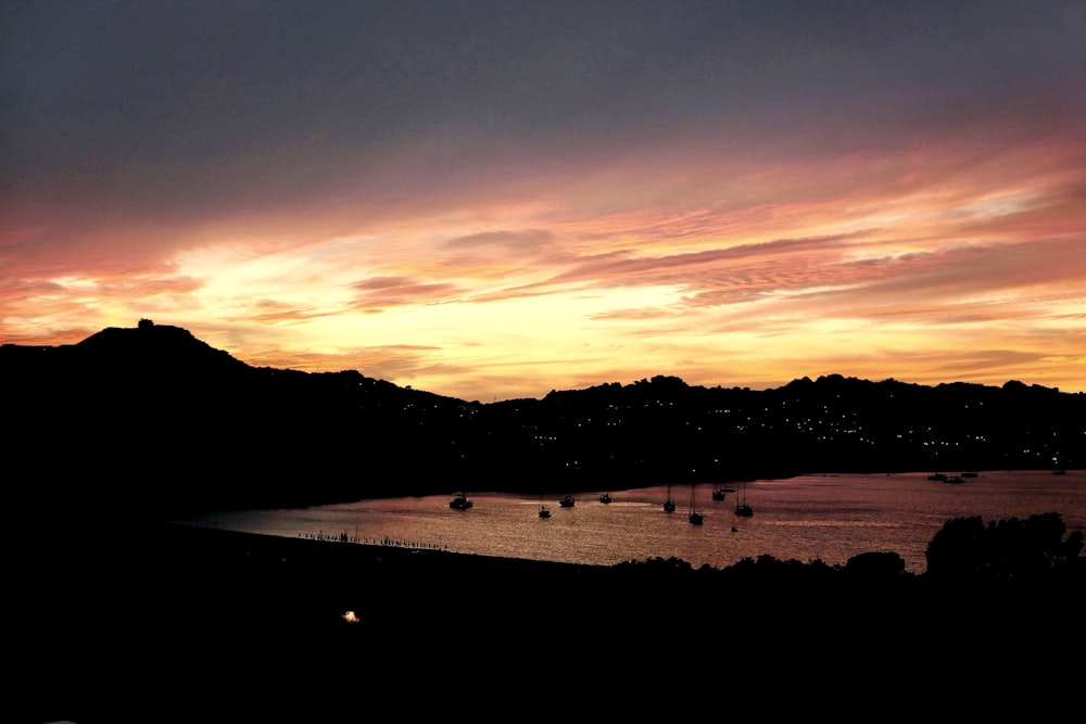 silhouette of mountain during sunset