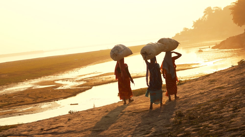 people walking on beach during daytime