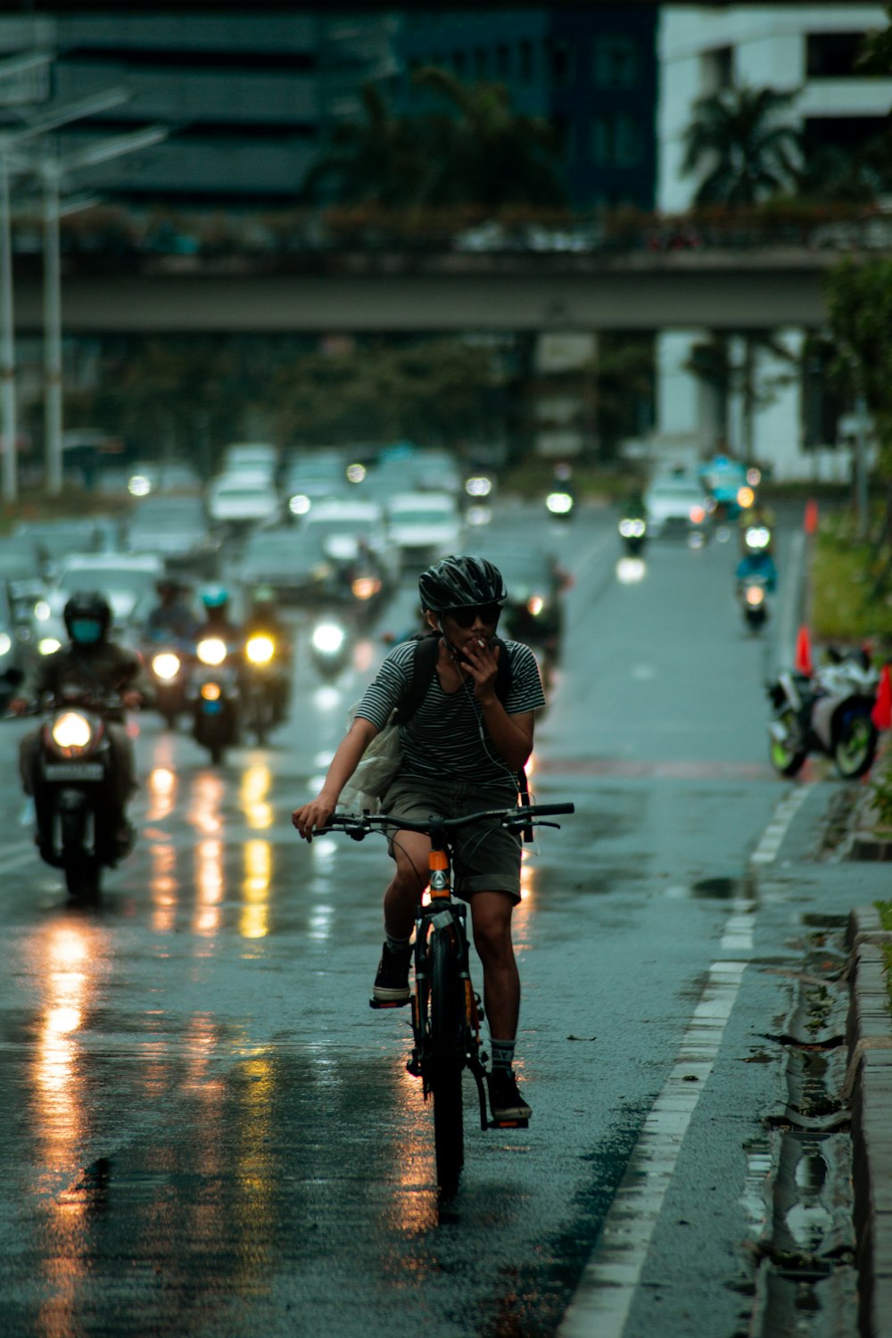 woman riding bicycle on road during daytime